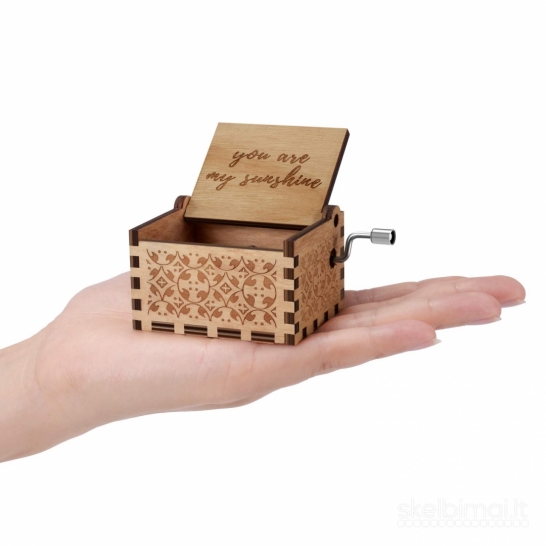 Mechaninė medinė muzikinė dėžutė