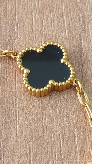 auksinė ir juoda Van Cleef apyrankė