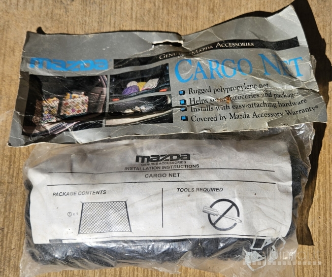 Mazda krovinio fiksvimo  tinklas 