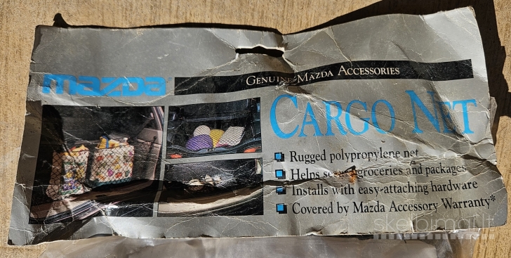 Mazda krovinio fiksvimo  tinklas 