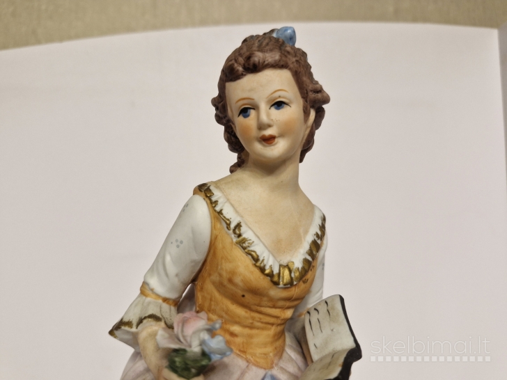 Porcelianinė figūrelė "Mergina su knyga ir gėlėmis", apie 28,5cm.