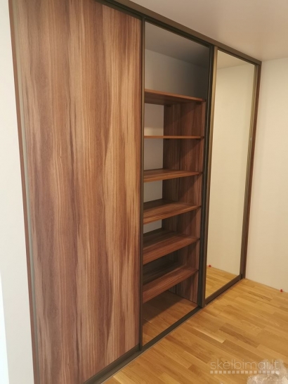 Spintos su stumdomomis ir varstomomis durimis • Drabužinių gamyba pagal užsakymą