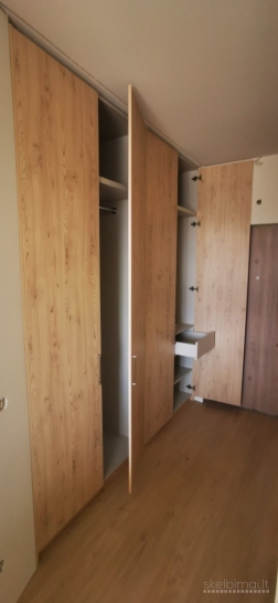 Spintos su stumdomomis ir varstomomis durimis • Drabužinių gamyba pagal užsakymą